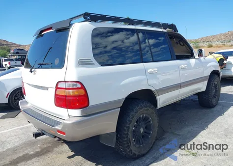 2000 Toyota Land Cruiser from USA, damaged, VIN JT3HT05J9Y0082581